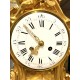 Louis XV style gilt bronze clock