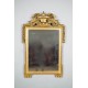 Louis XVI gilded wood mirror with pediment 18th century