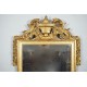 Louis XVI gilded wood mirror with pediment 18th century
