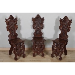 Three Renaissance-style "escabelle" chairs