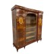 Louis XVI style bookcase inlaid with gilded bronzes