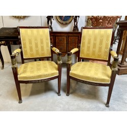 Pair of armchairs in the Retour d'Egypte style, gilded bronzes