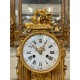 Louis XVI style gilt bronze clock