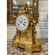 Louis XVI style gilt bronze clock