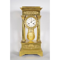 Empire gilt bronze clock