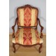 Pair of Regency-style walnut armchairs